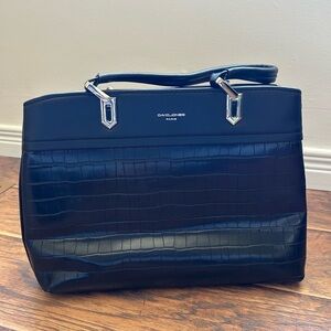 Sleek Black and Silver Crossbody Bag with Structured Design